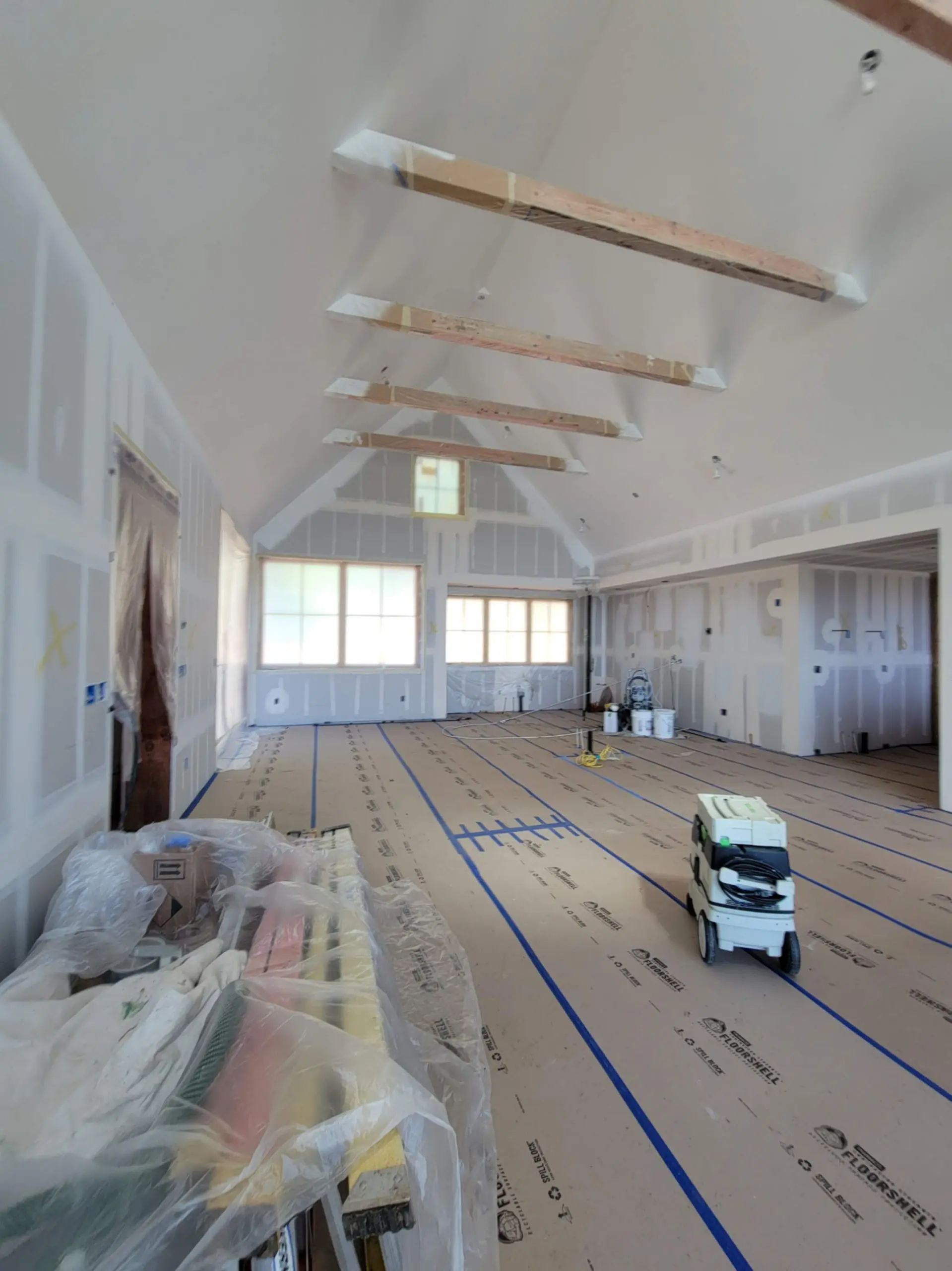 Interior painting in progress on a vaulted-ceiling Hood River home