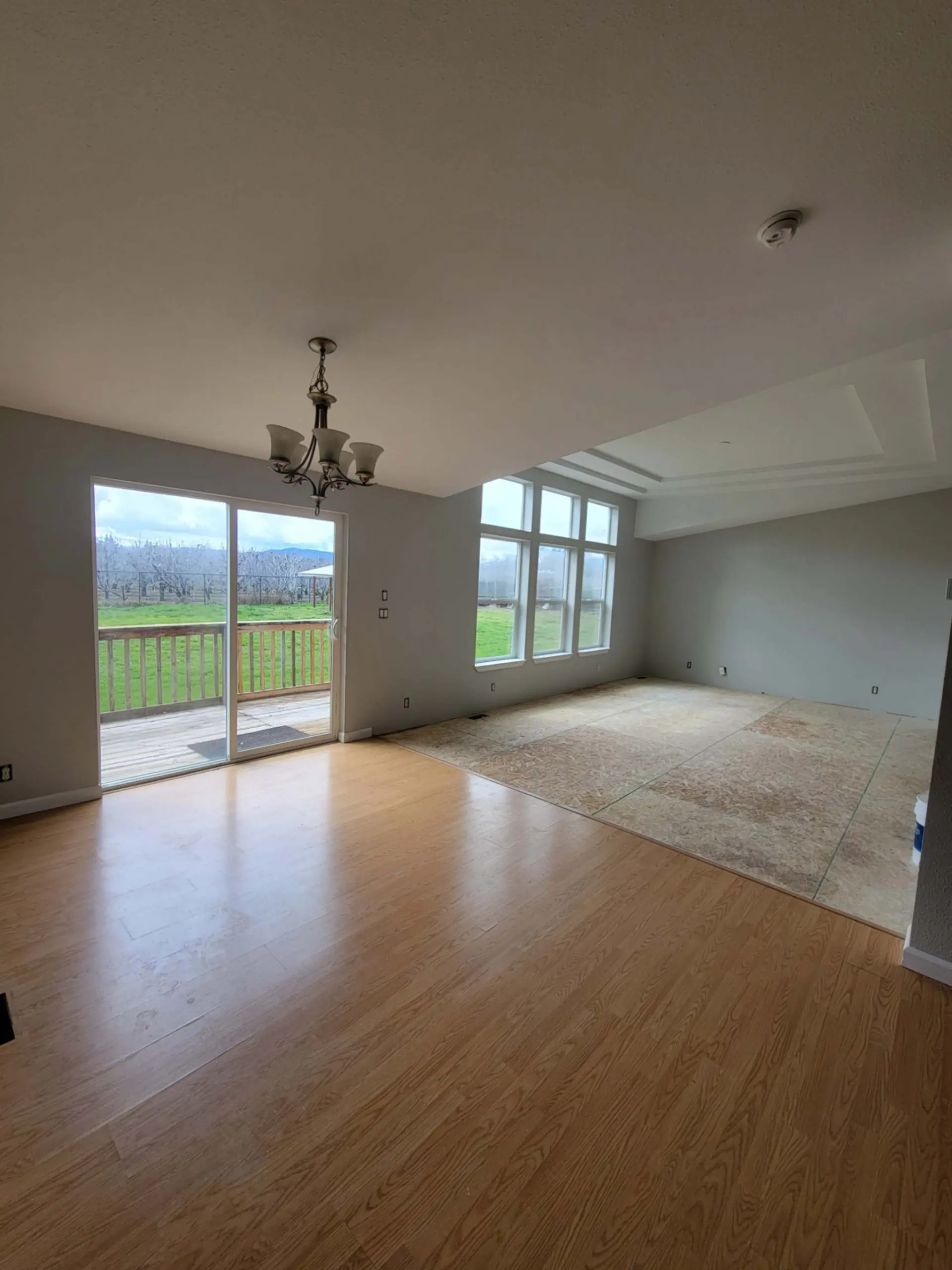 Freshly painted open interior with hardwood floors in a Hood River home