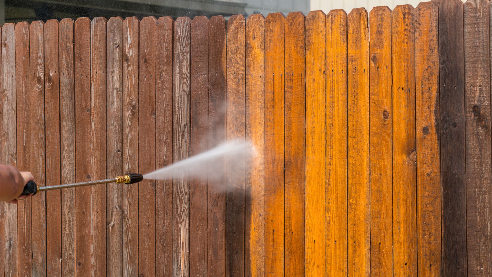 professional pressure washing wooden fence