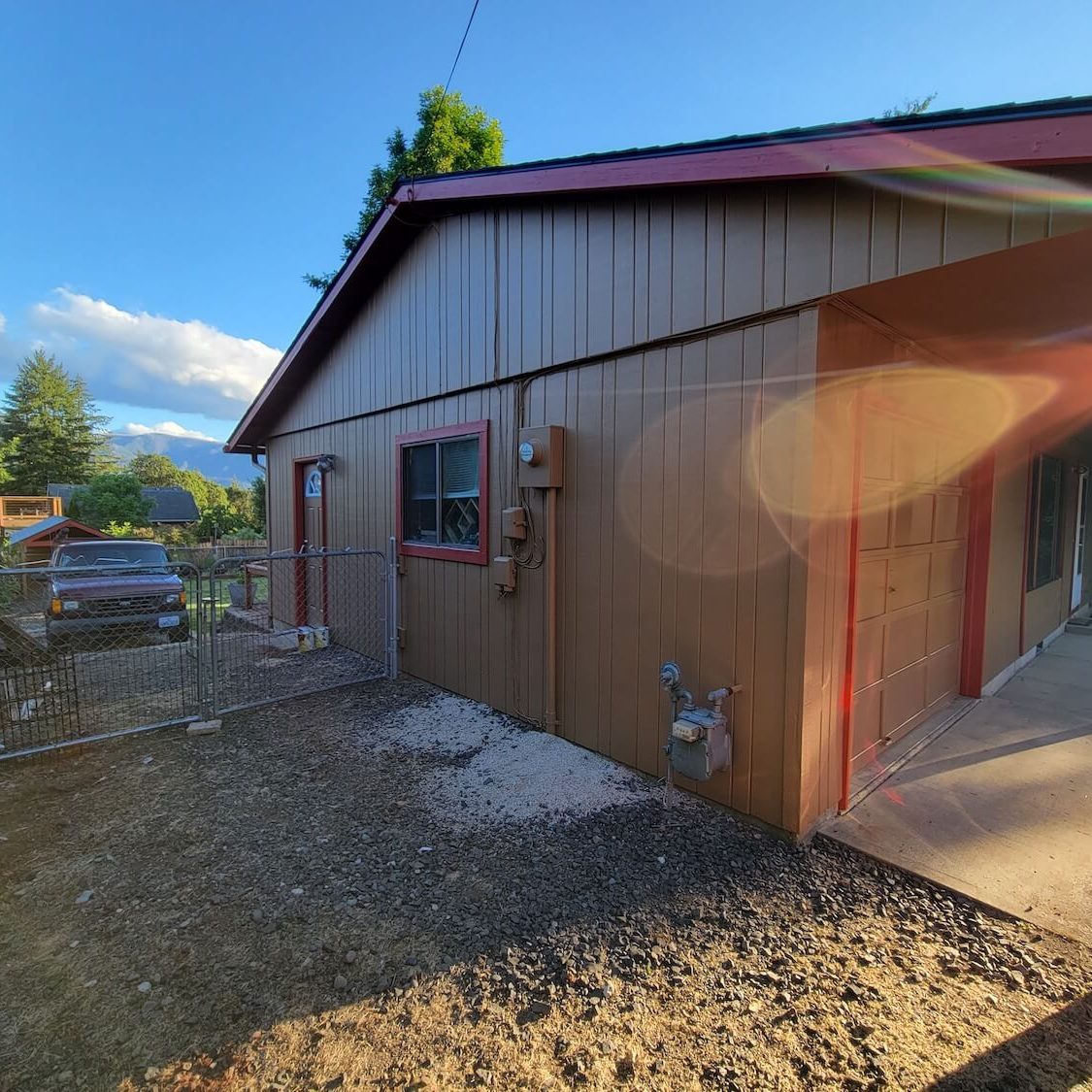 Full Bloom painting crew preparing an exterior for coating